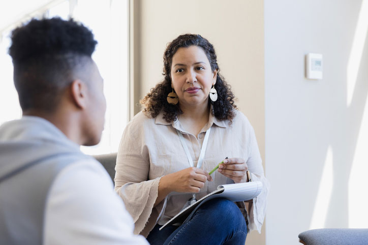 school counselor listening to student